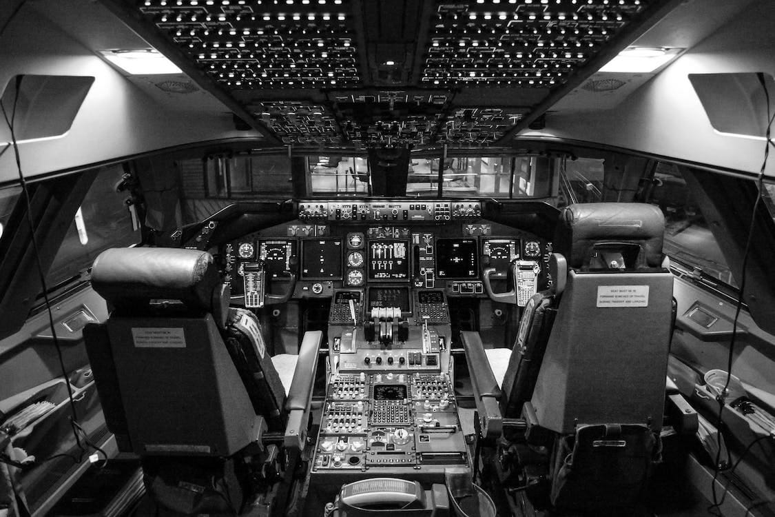 Black and white image of airplane cockpit