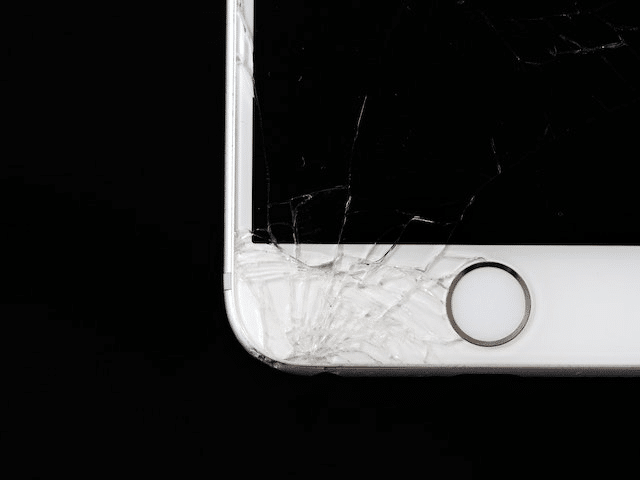 Shattered white iPhone screen